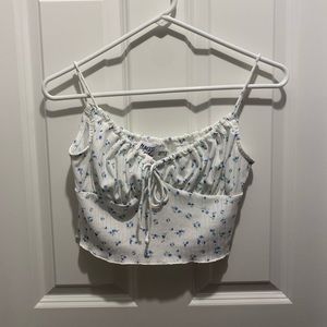 Princess Polly white and blue floral tank top.